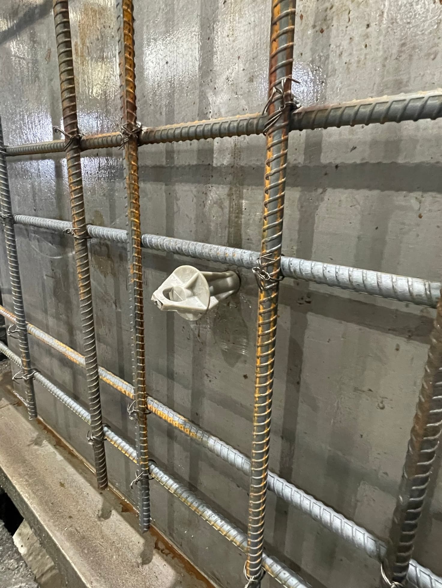 Bell Utility Insert placed in a concrete structure